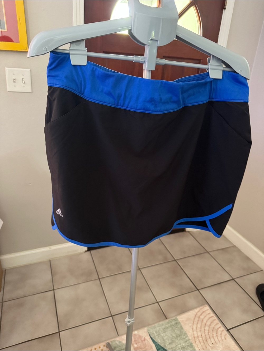 adidas Black Golf Skort with bright Blue Waistband and Trim